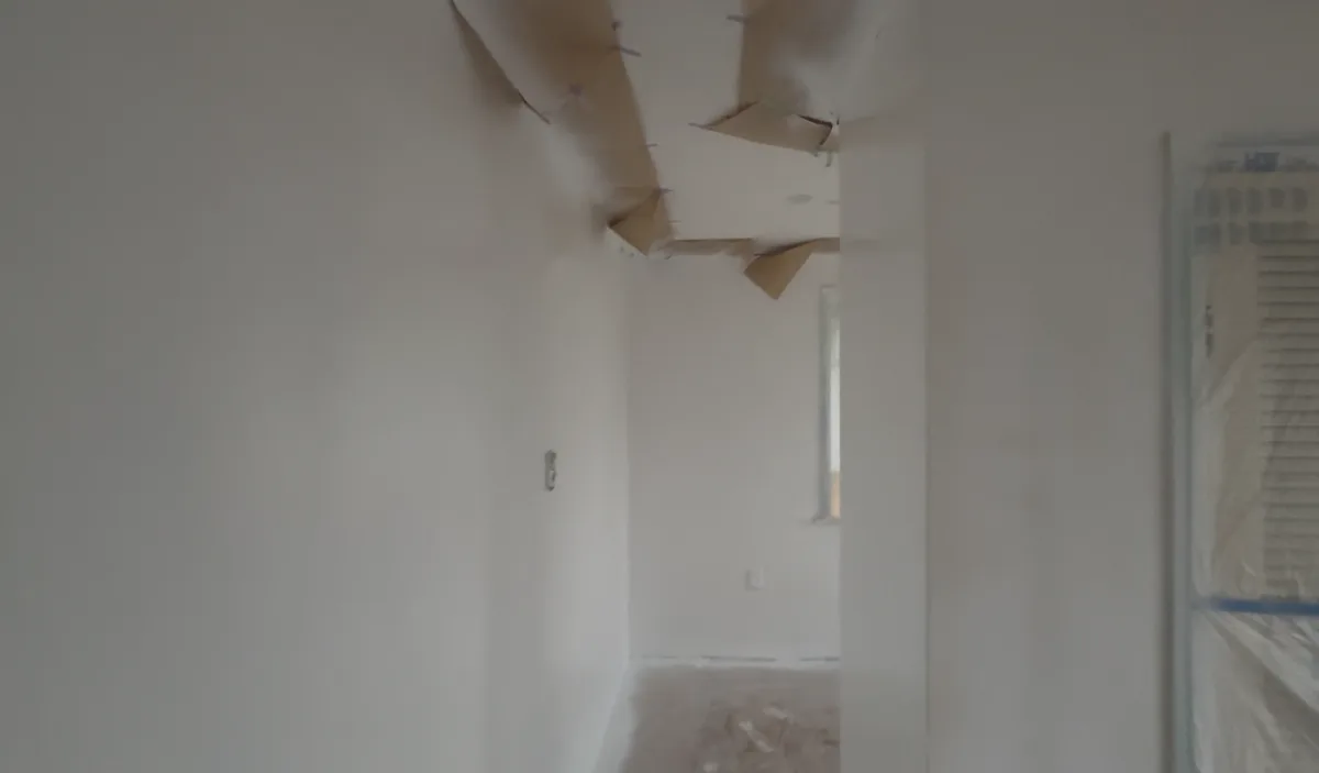 Wallpaper being removed before restoration in Owhata