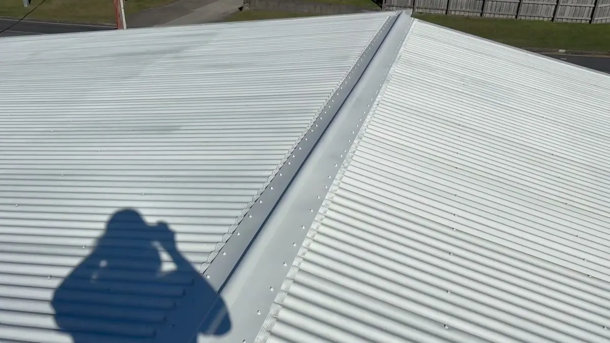 Corrugated iron roof upgraded from lead-head nails to Class 4 roofing screws