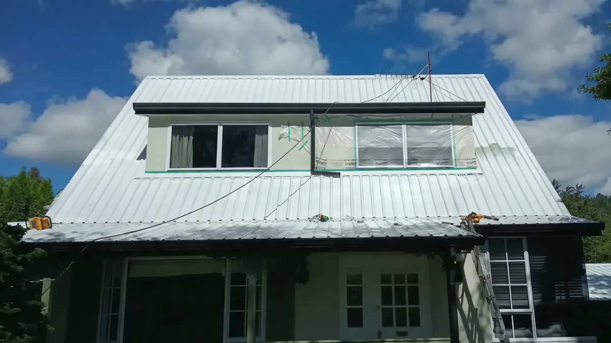 Pre-coat steep corrugated roof where more than 300 loose nails needed Class 4 screw replacement